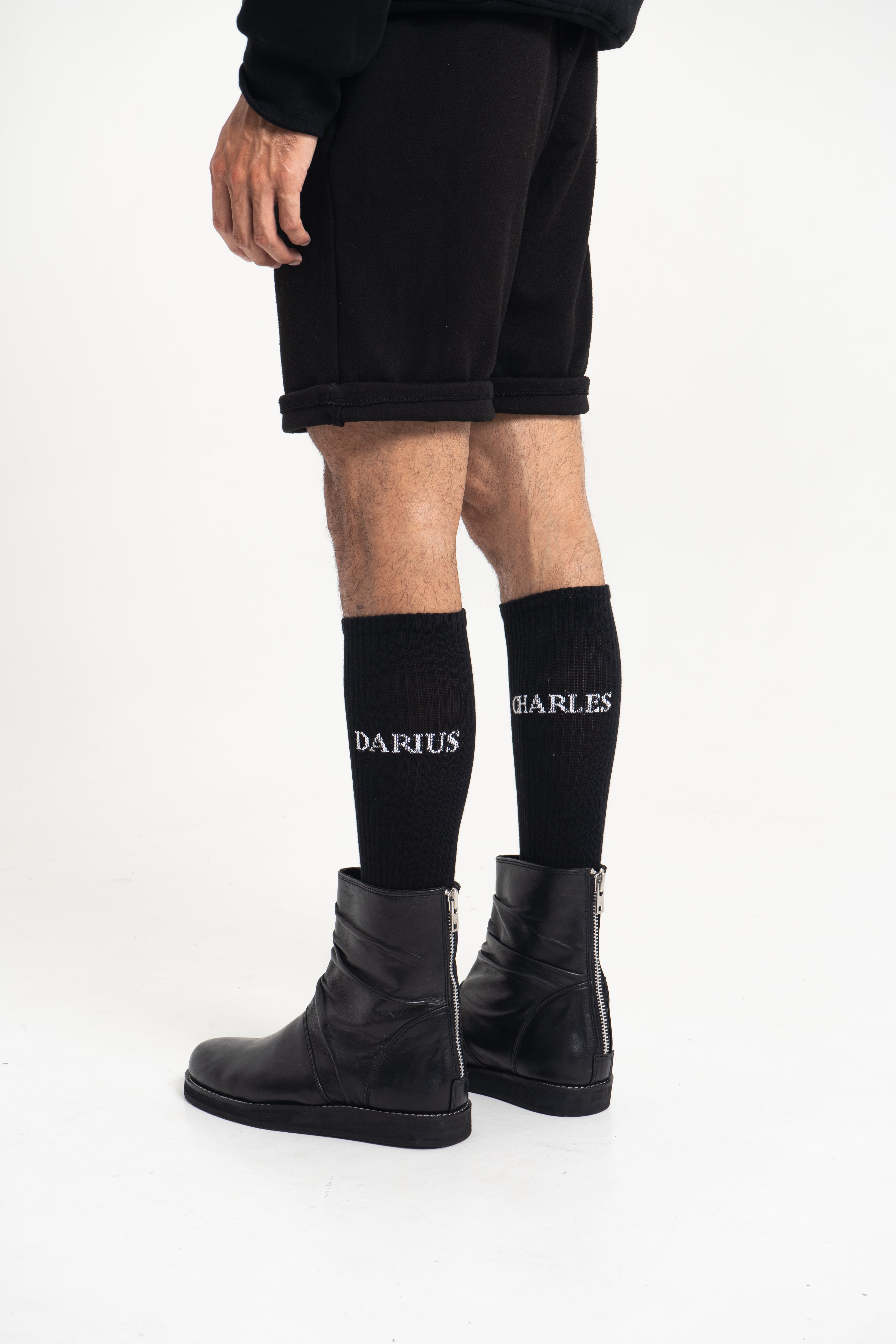 Close-up of CD woven logo on Charles Darius High Socks