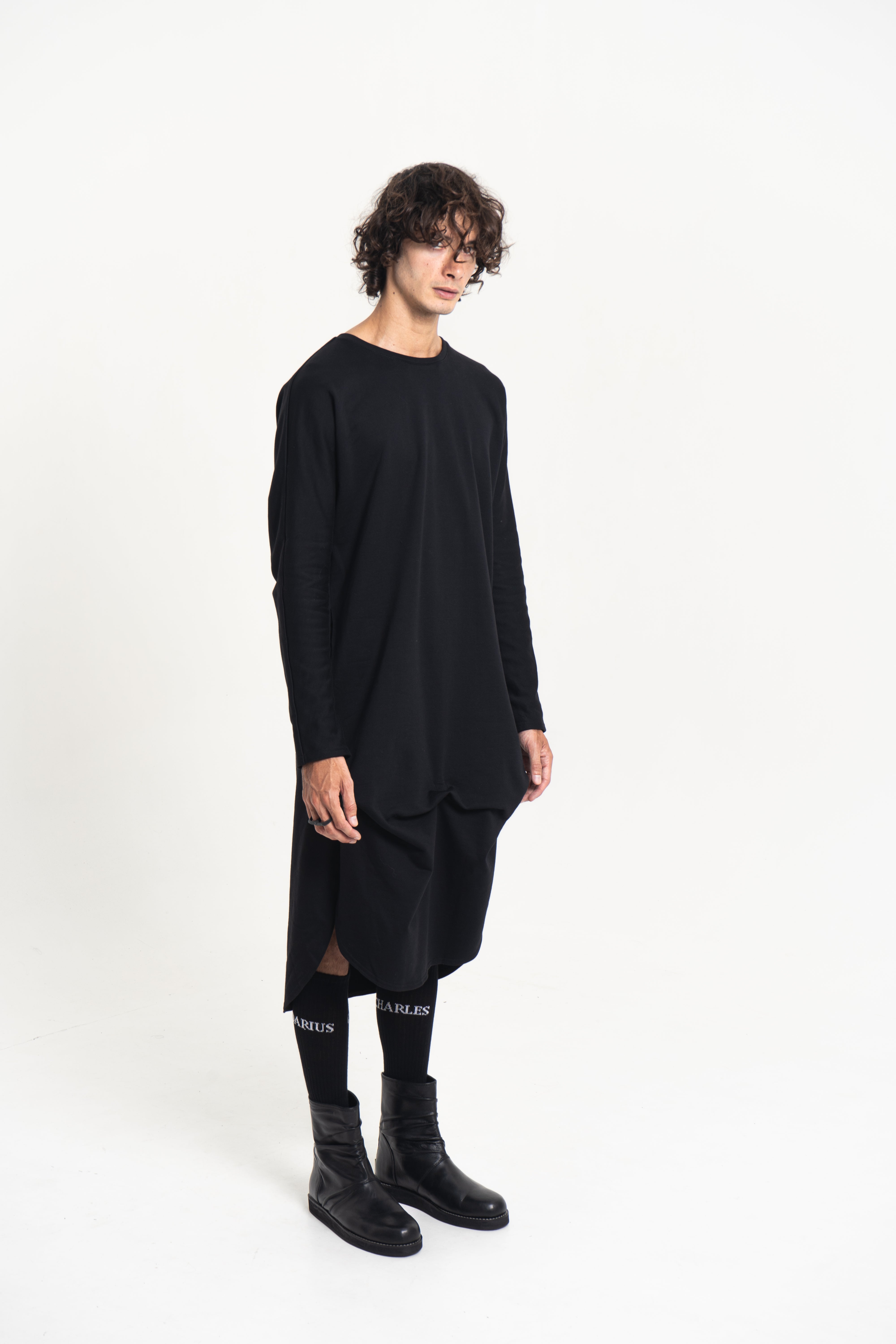 Model wearing the Origami Tunic Shirt front view in black Japanese cotton