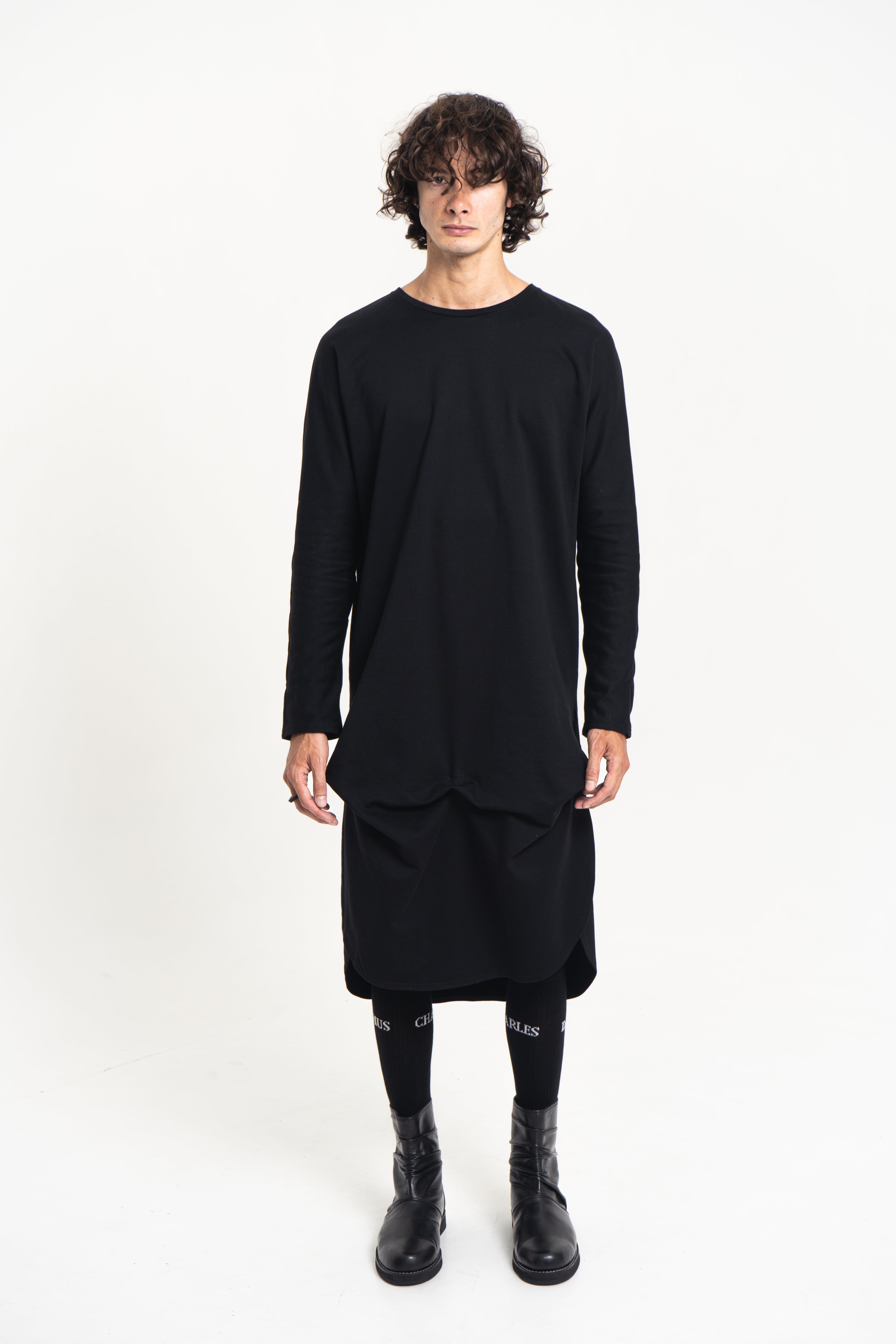 Side profile of the Origami Tunic Shirt showing drape and length