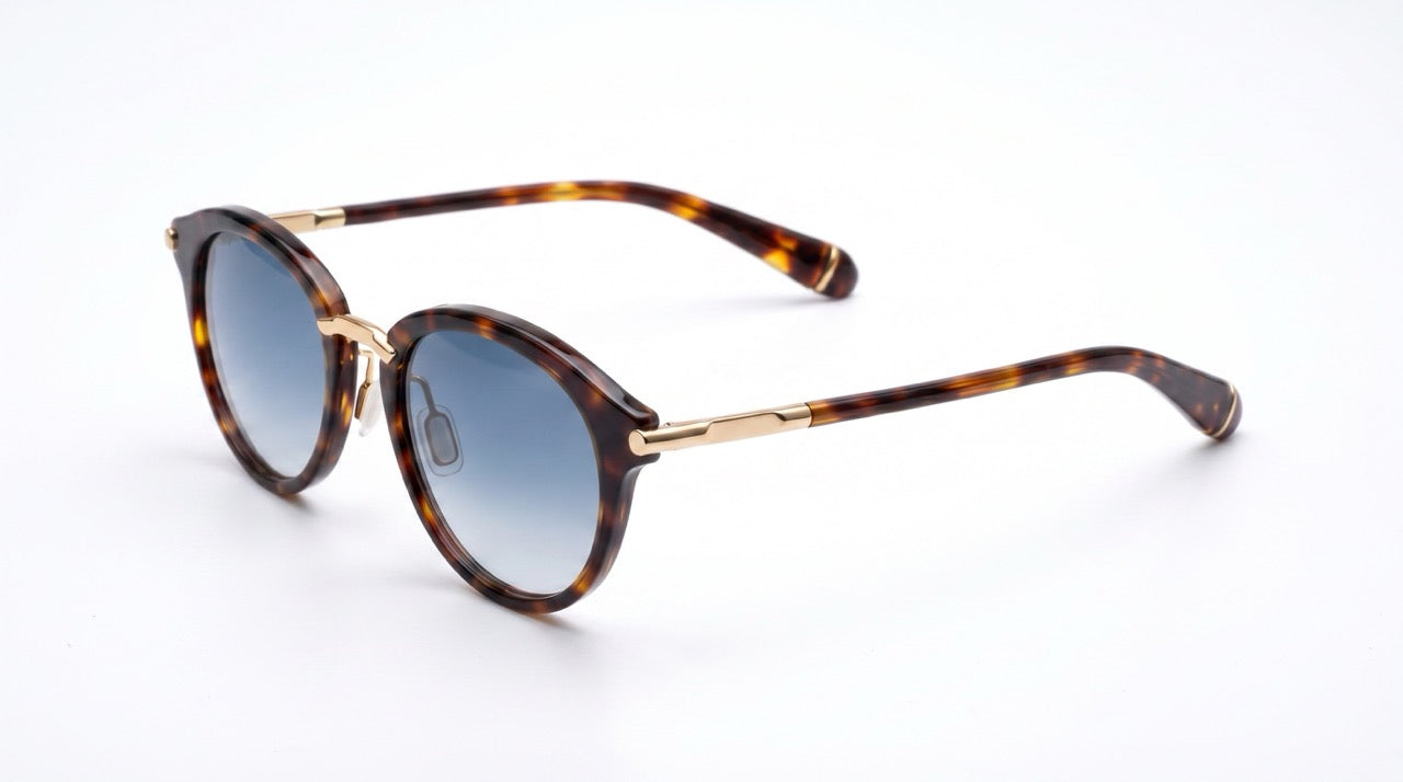 TAKUMI Tortoise sunglasses — hero view, gradient blue lenses